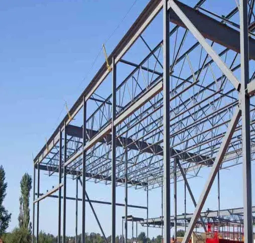 Steel roof trusses rising above a new building